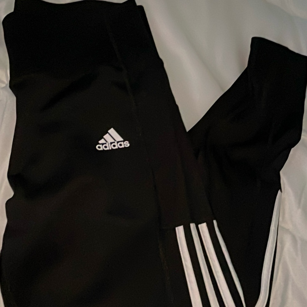 Adidas Black Sweatpants with Tapered Fit and White Stripes
